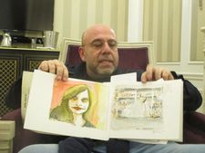 Paolo Virzì shows off his notebook with watercolors of his daughter and Gary Greengrass